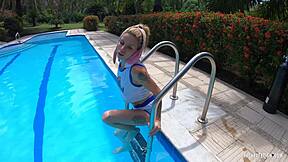 Does skinny blonde Ashley Rose wet pool bunny tease outdoors?