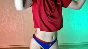 Studying hip hop dance moves in panties barefoot.