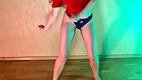 Studying hip hop dance moves in panties barefoot.