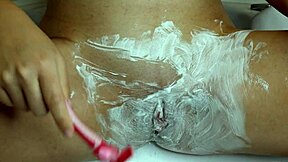 Closeup shaving transforms very hairy pussy smoothly