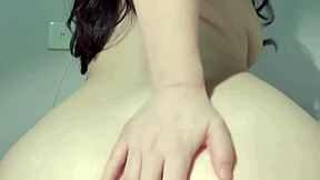 see her tease in sheer lingerie until she cums hard?