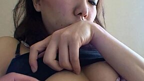 Curious how this lingerie-clad Japanese babe grinds cock in stockings?