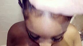 ebony babe deepthroats big cock in shower