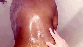 ebony babe deepthroats big cock in shower