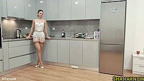 vintage nerd in white lingerie parades stockings high heels