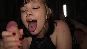 awkward teen in evening dress gives deep blowjob to huge cock