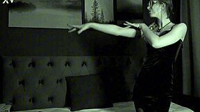 she dances sexy in black and white dress showing curvy ass and big pussy lips