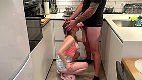 Deep kitchen blowjob spills hot cum across eager tits