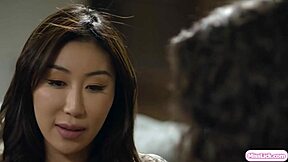 latina lesbian grinds face on asian girlfriend while fingering shaved pussy