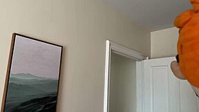 brunette freya von doom pops out wall for big dick facial