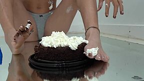 raven rogue's petite feet dunked in giant chocolate pudding tube on beat2feet 🍫👣😋