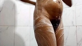 Wow, watch this desi teen play with her huge tits while bathing!