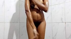 Wow, watch this desi teen play with her huge tits while bathing!