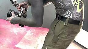 backstage latex femdom shoot with petite goth licking pierced nipples and pussy