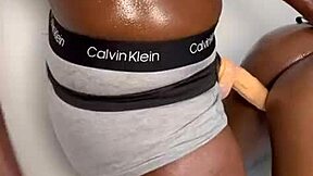 lesbian duo explores licking and strap-on play intimately