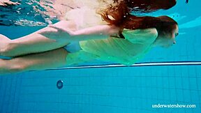 russian shy blonde nina mohnatka swims her small tits underwater hot