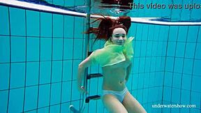 russian shy blonde nina mohnatka swims her small tits underwater hot