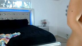 petite brunette grabs dildo for solo tit play?