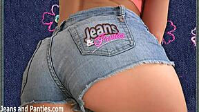 skinny teen slowly peels off tight jeans revealing her panties and ass