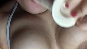 watch this cock hungry slut slobber on dildo as juicy tits jiggle!