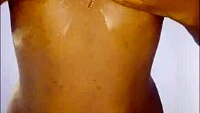 oily ebony babe's puffy nipples beg for your close-up jizz load