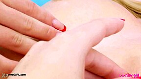 adorable blonde teen model poses sexy body on sofa photoshoot