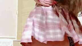 cute girl in sexy fishnet dress dances teasing miniskirt panties