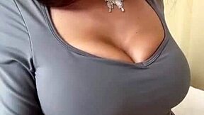 Stepmom rams her big tits and huge black dildo on webcam