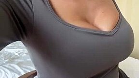 Stepmom rams her big tits and huge black dildo on webcam