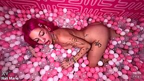 Nali Marie's bimbo teen whore grinds boobs on dirty feet in ballpit