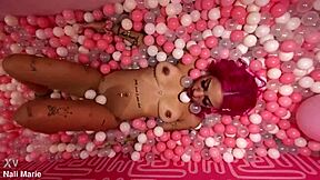 Nali Marie's bimbo teen whore grinds boobs on dirty feet in ballpit