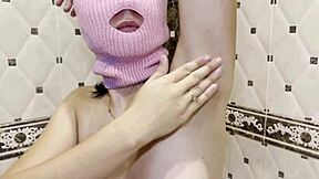 She winces through PAINFUL epilation, SHAVING hairy armpits with buzzing epilator in bathroom agony