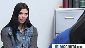 security guard bends shoplifting teen over desk for rough office pounding.