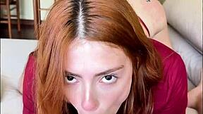 Flexible redhead swallows cock then shakes ass on it moaning wild
