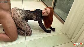how does this redhead in fishnets take rough floor pounding till cum on ass?