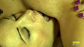 Lesbian threesome devours pussies up close in steamy bed romp