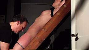 teasing bound slave ass into total submission