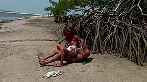 Sexy redhead enjoys beach fuck by the sea