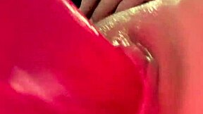 Close up of tight pussy stretched by a pink dildo