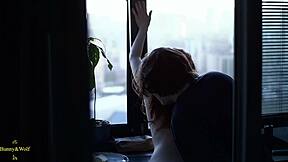 a lesbian couple's cozy kitchen fingering and licking session