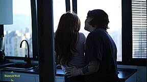 a lesbian couple's cozy kitchen fingering and licking session