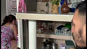stepmom plays with her big tits in kitchen