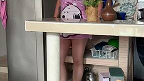 stepmom plays with her big tits in kitchen