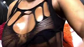 curvy ebony babe uses big dildo on her ass