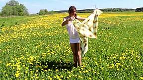 Beautiful Ananta Shakti Masturbates Pussy On A Field With Dandelions