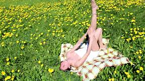 Beautiful Ananta Shakti Masturbates Pussy On A Field With Dandelions