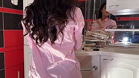 Hot petite brunette babe in the bathroom prepares