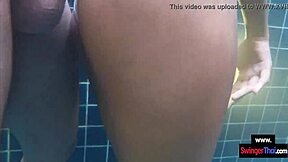 Thai teen gives pool blowjob to boyfriend