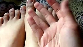 Pies de venezolana teen doing footjob in private