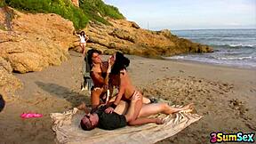 julia enjoys threesome cock and pussy on beach